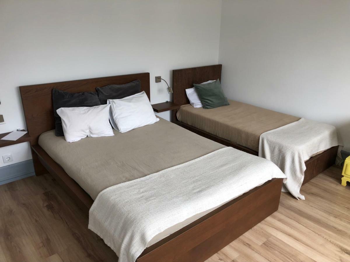 Quarto Triplo com Casa de Banho Privativa
